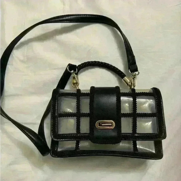 Handbags - Woman’s clear black purse with gold  accents